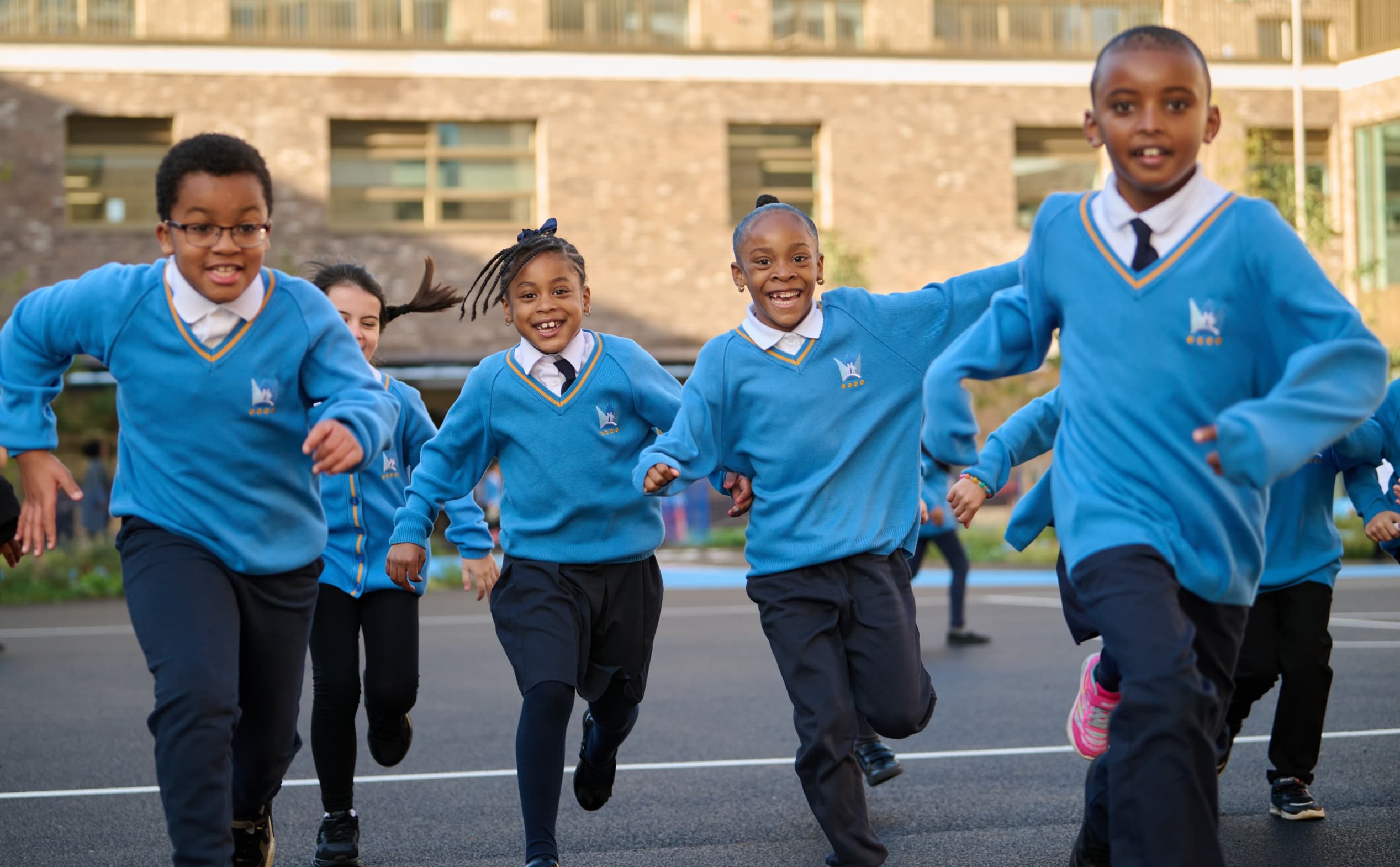 Kids running a playground